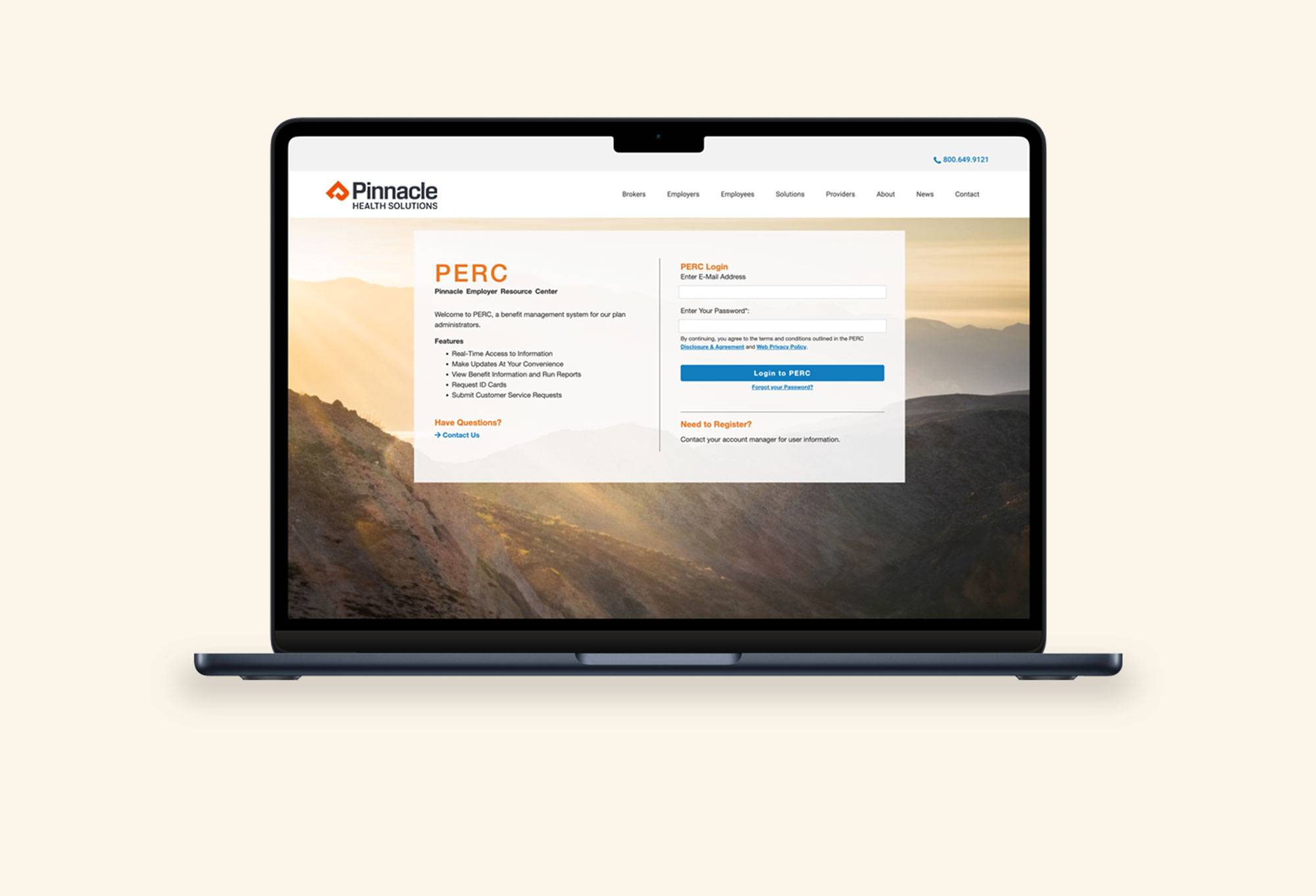Laptop open showing portal for Pinnacle Health Solutions.